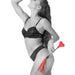 Side view of model holding Sex & Mischief Amor Red Heart Crop and Flogger