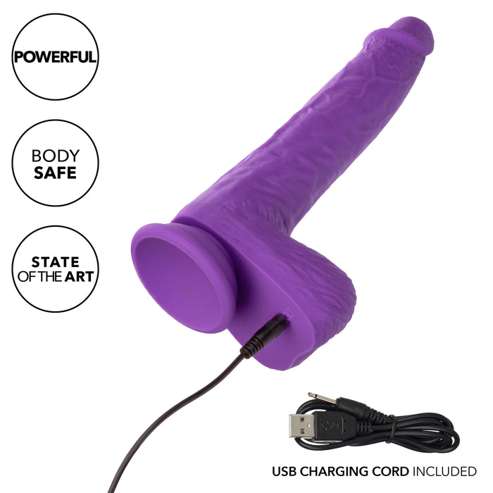 A pink, textured vibrator crafted from silky silicone, the CalExotics Silicone Stud Rumbling & Thrusting 9.5 Inch Dildo features a suction cup base and is connected to a USB charging cord. The image highlights attributes such as "Powerful," "Body Safe," and "State of the Art." The separately shown charging cord ensures you're always ready for intense action.