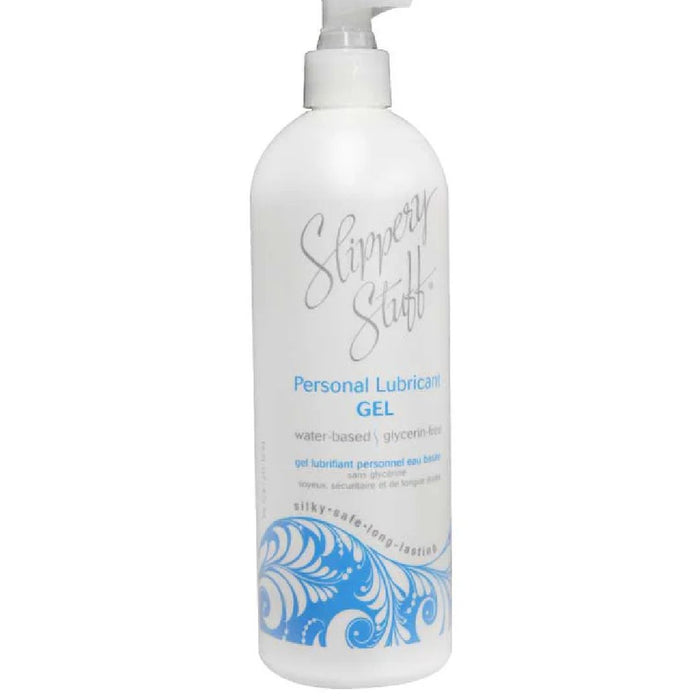 A white bottle of Slippery Stuff Ultra Slick Water Based Gel Lubricant - Various Sizes with a pump top. The label, in elegant cursive and blue text, indicates that this water-based, paraben-free lubricant from Wallace O Farrell Inc is glycerin-free. Decorative blue swirls adorn the bottom of the bottle, emphasizing its slippery lube nature.