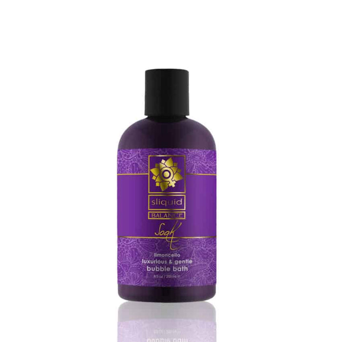 A purple bottle of Sliquid Soak Luxurious Gentle Bubble Bath with a black cap, featuring the label "Limoncello" and highlighting "Luxurious & gentle bubble bath." The product is crafted with natural ingredients, boasts a cruelty-free and vegan-friendly formula, and comes in an 8.5 fl oz (255 ml) bottle set against a white background.