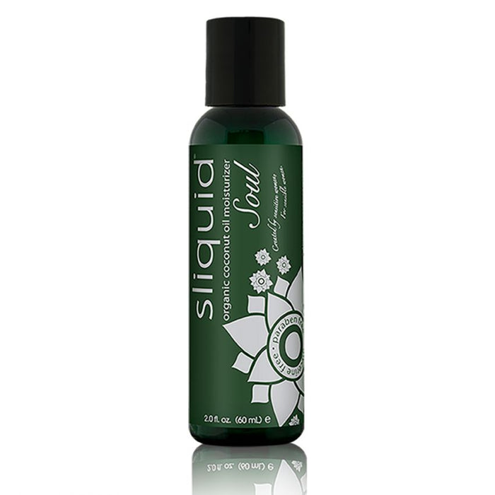 A 2-ounce (60 mL) bottle of Sliquid Soul Coconut Oil Moisturizer by Sliquid is displayed against a white background. The green bottle with a black cap features a silver floral design and text detailing the product's attributes, including apricot kernel oil for enhanced skin hydration.