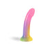 Introducing the Lovely Planet Stargazer Rainbow Ombre Glitter 7 inch Silicone Dildo—a vibrant dildo that features a stunning flared base and a smooth texture. It showcases an eye-catching color gradient, transitioning gracefully from pink at the top to purple, blue, and yellow at the bottom. Perfectly designed for g-spot play or pegging, this realistic-shaped toy stands upright against a white background.