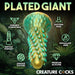 The image showcases the Stegosaurus Spiky Reptile Silicone Dildo from XR Brands, highlighting its harness compatibility, reptile fantasy-inspired design, distinctive texture, suction cup base, phthalate-free composition, and premium silicone material. The background features a jungle-like environment with lush greenery.