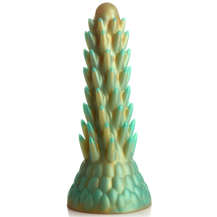 The Stegosaurus Spiky Reptile Silicone Dildo by XR Brands is a stylized sculpted object resembling a textured pine cone or tree. Predominantly green with gold accents, it features numerous small, pointed protrusions and a smooth, rounded tip at the top. Made from premium silicone, this silicone sex toy offers both elegance and functionality.