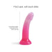 A vibrant glittery pink ombre dildo, perfect for prostate or G-spot play, shown against a white background. The "Sunrise Pink Ombre Glitter 7 inch Silicone Dildo" by Lovely Planet features an insertable length of 14.8 x 3.5 cm (5.83 x 1.38 inches) and is made from flexible liquid silicone for an unforgettable experience.