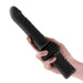 A hand is holding the NS Novelties Super Stroker Thrusting Heating Remote Control Dildo with Mount, featuring a ribbed section near the base and buttons on the handle. This cylindrical device offers multiple thrusting speeds for varied pleasure experiences.