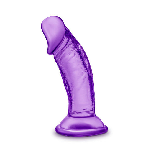 The Sweet n Small Beginner 4 Inch Dildo with Suction Cup by Blush is a purple, curved, and textured silicone adult toy with a flared base for secure use. Its phthalate-free surface boasts a realistic texture that enhances its overall appearance. Pictured standing upright against a plain white background, this toy offers both aesthetic appeal and functional design.
