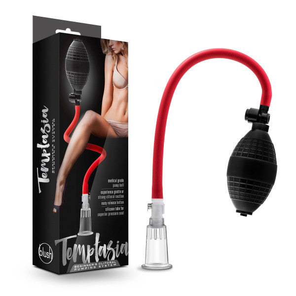 Box and product of the Temptasia Beginner's Breast and Clitoral Pumping System by Blush, featuring a clear suction cup connected to a black and red pump with a flexible hose for enhanced pleasure. Packaging includes an image of a person in lingerie.