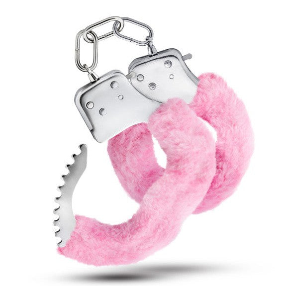 A pair of fluffy pink Blush Temptasia Furry Cuffs Handcuffs with a whimsical edge, symbolizing a playful approach to restraint for sexy role play.