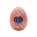 A product photo of a Tenga Egg Disposable Penis Masturbator - Spiral from the TENGA EGG Series. The oval-shaped packaging features a spiral pattern in a light color against an orange background. The label reads "Easy Beat EGG Spiral STRONGER!" in blue and white text, with the brand name "Tenga" at the bottom. Made with super-stretchable material.