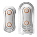 The Tenga Flip Orb Discreet Penis Masturbator - Orange Crash is displayed in two positions: one open and one in its clear case. This advanced stroker showcases a white design accented by two orange pleasure orbs, sleek contours, and translucent sections. The "Tenga Flip Orb" branding is prominently shown on the case.