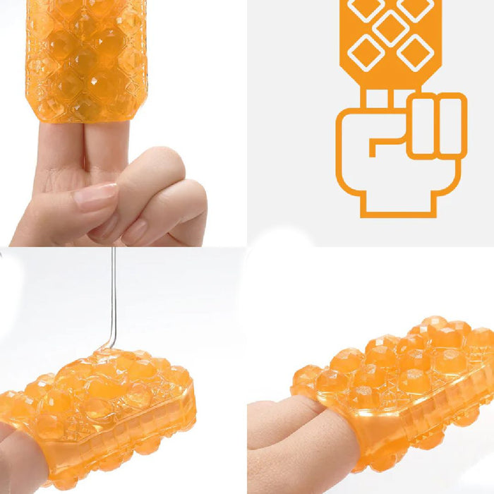 A composite image showing a Tenga Uni Topaz Textured Finger Sleeve for Stroking and Clit Massage in various states: held between fingers, stretched between hands, and pressed in a fist, alongside an instructional icon.