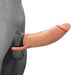 A close-up image of The Great Extender 2 in 1 8 Inch Penis Extender and Stroker - Vanilla by Nasstoys, designed to resemble a circumcised penis attached to a wearable harness. The product, featuring a light skin-toned appearance similar to a pocket pussy stroker, is detailed and shown extending outward from a grayscale human torso.