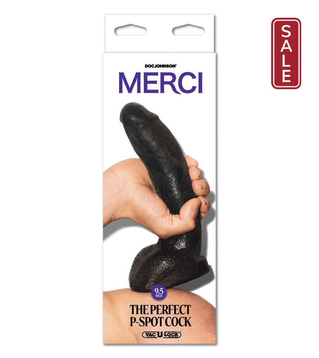 The image depicts the packaging for a product called "The Perfect P-Spot Cock 9 Inch Suction Cup Dildo - Black" by Doc Johnson. The packaging shows a hand holding a black, lifelike cock. The product includes the phrase "Vac-U-Lock system" and mentions the size as 9 inches.