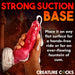 Image shows a hand holding The Phoenix Squirting 9 inch Silicone Fantasy Dildo by XR Brands, featuring a striking red and white design with a strong suction cup base. The background includes an erupting volcano with flowing lava. Text reads "Strong Suction Cup Base. Place it on any flat surface for hands-free fun or for an ever-flowing fountain of cum. Creature Cocks.