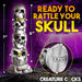 A promotional image showcasing the Tower of Doom Silicone Skull Dildo by XR Brands, a tall skull-themed object with measurements labeled: 7" height, 6" base circumference, 2" bottom width, 1.4" middle width, and 3.75" bottom circumference. Made from premium silicone with a strong suction-cup base. Text reads "READY TO RATTLE YOUR SKULL" and "CREATURE.