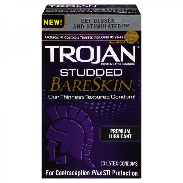 A box of Trojan Studded Bareskin Condoms 10 Package by Paradise Marketing. The packaging is predominantly dark purple with yellow highlights, featuring text that says "Trojan Thinnest Textured Condom!" and "Premium Lubricant." It contains 10 latex condoms offering ultimate sensitivity and STI protection.