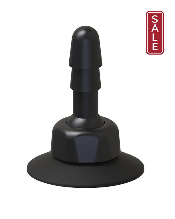 A black rubber suction cup with a flat, round base and a short cylindrical stem topped with a wider, rounded tip. The overall shape is simple and functional, designed for secure attachment to smooth surfaces for hands-free use, compatible with Vac-U-Lock systems. This Doc Johnson Vac-U-Lock Deluxe 360° Swivel Suction Cup Plug ensures stability and versatility in your experience.