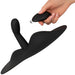 The VibePad 3 Ride On Hands-Free Humping Vibrator with G-Spot Probe by Orion, a black wearable personal massager with a curved base and a protruding stimulator, is being controlled by a hand holding a wireless remote control.