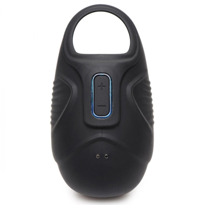 The XR Brands Vibrating Silicone Waterproof Ball Sack is a sleek and modern black portable device featuring a circular handle at the top and a central button with plus and minus symbols for volume control. It boasts ribbed grips on the sides and two small holes at the bottom front, while also being waterproof.