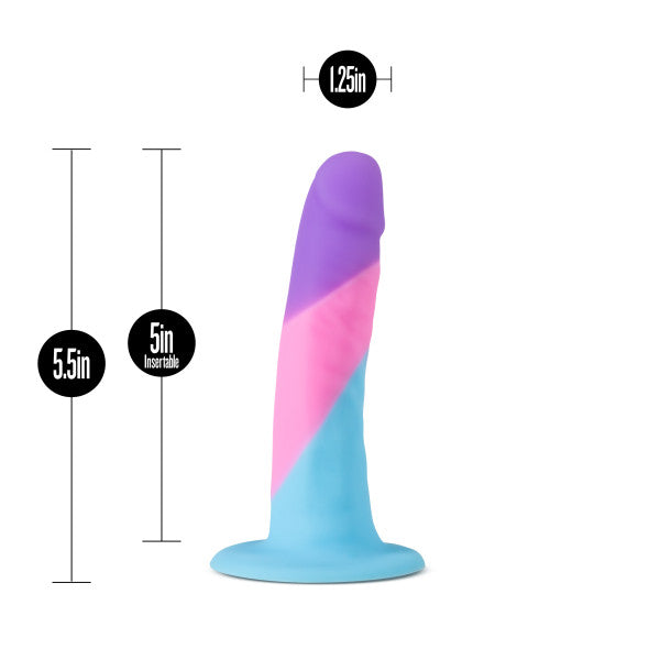 The Vision of Love Silicone Suction Cup 5.5 Inch Dildo by Blush is a multicolored beginner dildo crafted from platinum silicone. It features a vibrant swirl of purple, pink, and blue hues. Standing at 5.5 inches tall with an insertable length of 5 inches and a diameter of 1.25 inches, this dildo includes a flat base for stability and stands upright against a white background.