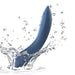 A sleek We-Vibe Rave 2 Powerful Adjustable G-Spot Vibrator in blue splashing into water, droplets surrounding it against a white background.