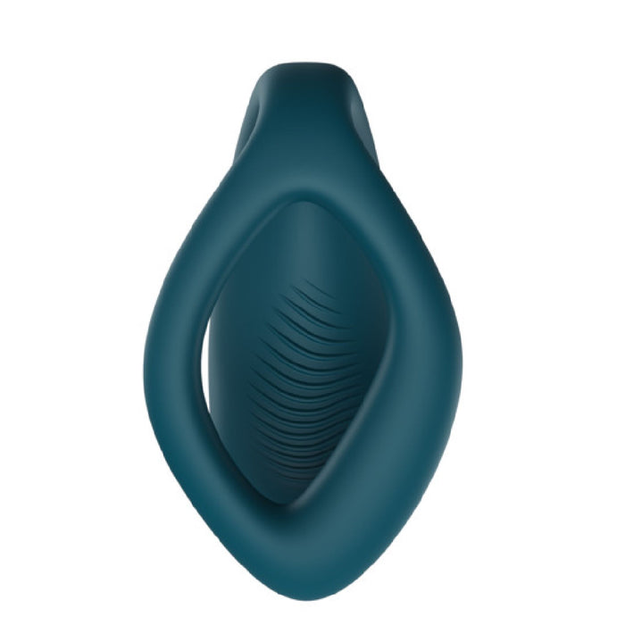 The We-Vibe Sync O Hands-Free Wearable Couples Vibrator by We-Vibe, showcased in an elegant green hue, is a sleek oval-shaped device with a central ribbed design, reminiscent of a cutting-edge personal care item. This couples vibe boasts app control and features a smooth, ergonomic outer edge. Its streamlined appearance is captured from above against a white background.