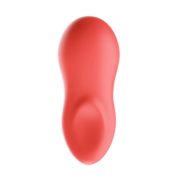 The We-Vibe Touch X Lay On Vibrator in Coral is a sleek and seamless, USB rechargeable personal massager designed for handheld use. Crafted from premium silicone, it features a red color with a smooth, ergonomically shaped design that includes a rounded top and curved contour.