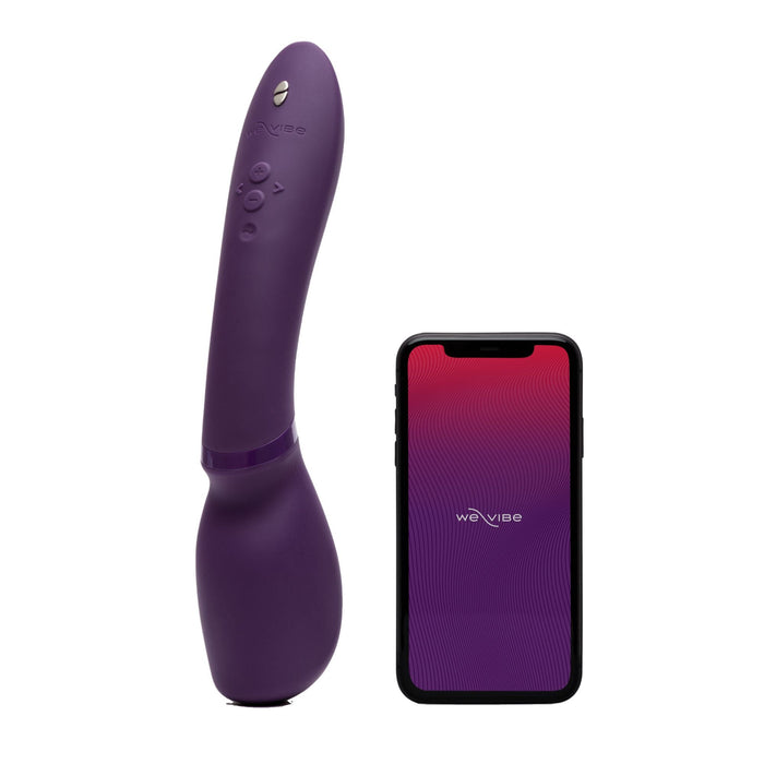 A purple We-Vibe Wand 2, an ergonomically designed cordless and waterproof vibrator with control buttons, is positioned next to a smartphone showing the red We-Vibe app screen featuring the brand's logo.