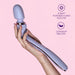 A hand holding the Blush Wellness Eternal Slim Ergonomic Powerful Remote Control Wand in lavender, characterized by its rounded head. The background features a light pink hue adorned with icons highlighting "PURIA™ Platinum-Cured Silicone" and "UltraSilk® Smooth." This sleek, waterproof wand boasts a smooth surface and includes a wireless remote control for added convenience.