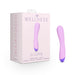 The image shows a purple Wellness G Curve Rumbly G-Spot Vibrator made of silky silicone next to its packaging box, which is light pink with white text and features the brand name "Blush." The box lists various features, including 10 functions, being waterproof, and USB rechargeable.