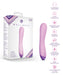 Image of the Blush Wellness G Curve Rumbly Waterproof Silicone G-Spot Vibrator in light purple next to its packaging. The predominantly white box showcases the same product image. To the right, icons highlight its features: 10 vibrating functions, silky silicone, rechargeability, water resistance, and a 1-year warranty.