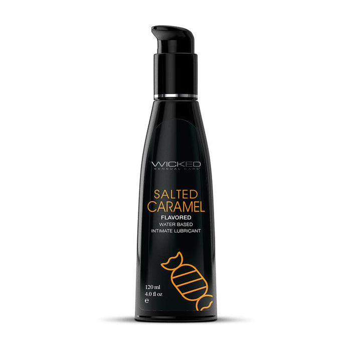 A black bottle labeled "Wicked Aqua Salted Caramel Flavored Water Based Lubricant 2oz" from Wicked Lubes, with a pump dispenser. The bottle, featuring an image of wrapped caramel candy, boasts a water-based formula that is sugar-free and contains 60 ml (2 fl oz).