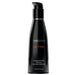 A sleek black bottle of Wicked Ultra Fragrance Free Silicone Lubricant designed for water play, on a white background.