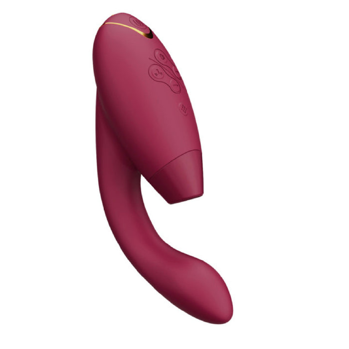 The Womanizer Duo 2 Pleasure Air Clitoral & G-Spot Rabbit in Bordeaux by Womanizer is a maroon-colored, handheld electronic device with a curved shape. Featuring buttons on its smooth surface, it is designed for ergonomic handling and ease of use. This device offers customizable pleasure with options like g-spot vibration to enhance your experience.