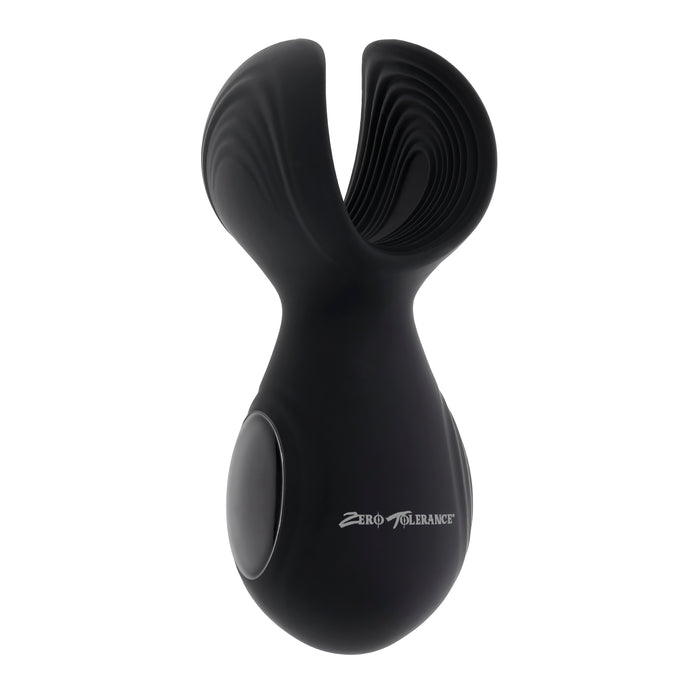 The Handy Helper Petite Hand Held Vibrating Masturbator by Evolved Novelties is a sleek, black silicone massager with a modern, curved design. It features a textured, split top and a smooth, ergonomic handle. The flexible silicone cradle ensures comfort while using. The words "Zero Tolerance" are printed on the side in white letters.