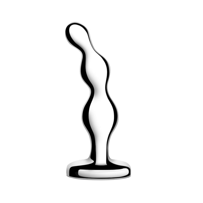 Against a white background stands the b-Vibe Stainless Steel Weighted Anal Beads for Prostate, a silver metallic sculpture with a fluid, wavy form that rises vertically on a round base. This body-safe product from b-Vibe features a sleek, reflective surface and an abstract design reminiscent of stainless steel anal beads.