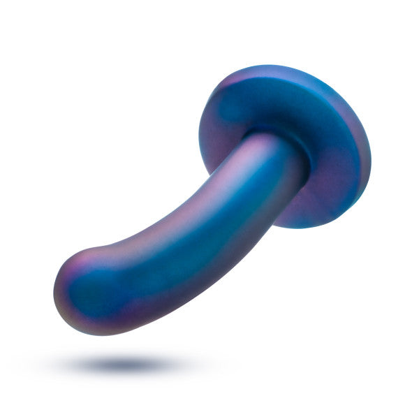 The Surrender Intermediate 5.75 Inch Silicone Beginner & Pegging Dildo by Blush, showcasing its body-safe silicone shaft with a blue-toned curved design and wide base, is elegantly displayed against a white background.