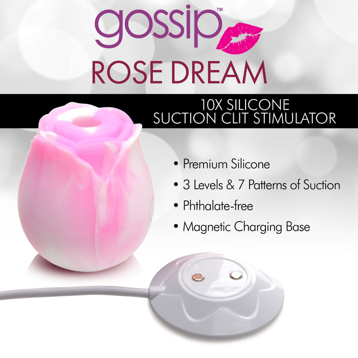 The "Rose Dream Pink Swirl" by XR Brands is a rose-shaped silicone suction stimulator designed for clitoral pleasure. It features body-safe silicone, 3 levels and 7 patterns of suction, and comes with a magnetic charging base. This phthalate-free device is elegantly presented against a soft, blurred background.