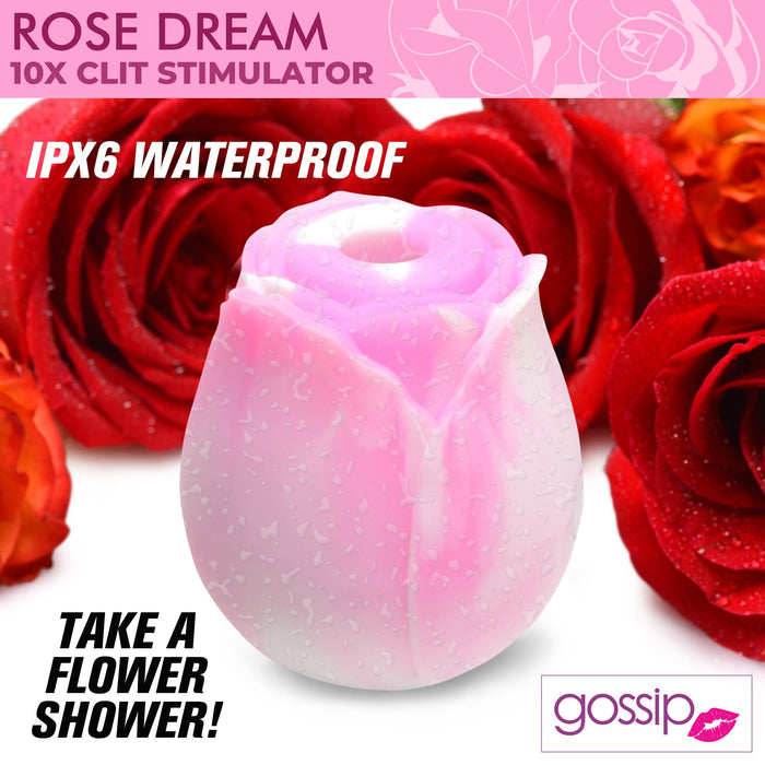 A pink and white rose-shaped clitoral stimulator, adorned with water droplets and nestled among red roses, introduces "The Rose Dream Pink Swirl Powerful Clitoral Stimulator" by XR Brands. Featuring the phrases "10X Clit Stimulator" and "IPX6 Waterproof," it promises an exquisite experience in clitoral stimulation. The silicone body-safe logo "gossip" is elegantly placed in the corner.