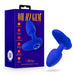 Presenting the "Mystery Vibrating Textured Silicone Butt Plug in Sapphire" by Blush – a blue silicone anal toy adorned with a gem-like end, showcased next to its eye-catching purple and blue packaging. The "Oh My Gem!" box emphasizes 7 vibration modes, magnetic charging, and a luxurious platinum cured silicone texture for unparalleled comfort and pleasure.