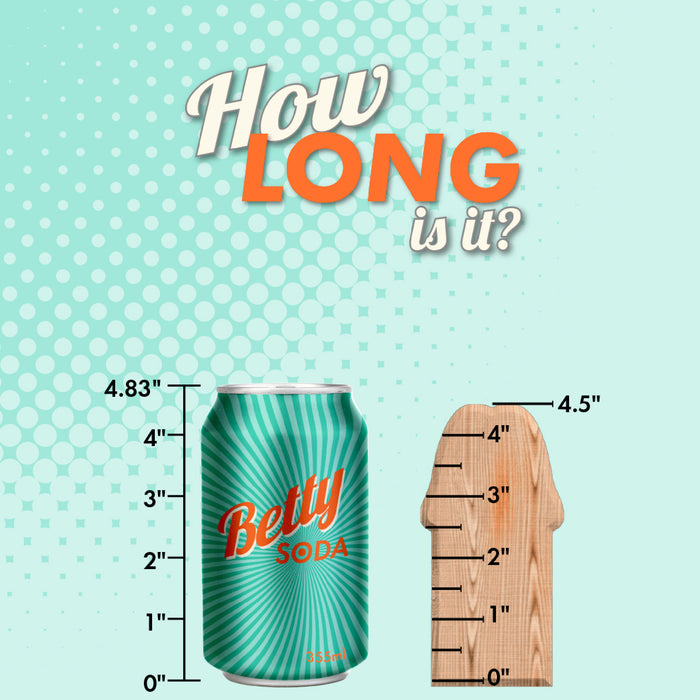 The image displays a green can labeled "Betty Soda" next to a popsicle-shaped wooden cutout, both accompanied by measurements from a ruler. Text above asks "How Long is it?" with the soda can at 4.83" and the cutout at 4.5". The playful light blue polka-dotted background is reminiscent of measurement themes often associated with the Surrender Slim 4.75 Inch Silicone Beginner & Pegging Dildo by Blush.