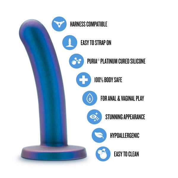 The Surrender Intermediate 5.75 Inch Silicone Beginner & Pegging Dildo by Blush is displayed next to bullet points emphasizing its features: harness compatible, easy to strap on, constructed from Puria platinum cured silicone, 100% body safe, ideal for anal play and pegging, visually stunning design, hypoallergenic properties, and easy-to-clean surface.