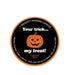 A circular label for the Kama Sutra "Pumpkin Spice Erotic Massage Candle - Your Trick, My Treat" featuring a smiling jack-o'-lantern illustration. The text reads: "Your trick... my treat! PUMPKIN SPICE, coconut oil-based. Light Me. Let Me Melt. Drizzle All Over Your Body. Enjoy A Warm, Relaxing Erotic Massage." The border is black and orange.
