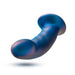 Introducing the Rebellion 5.75 Inch Silicone Beginner & Pegging Dildo by Blush: a shimmery blue dildo crafted from platinum-cured silicone, featuring a curved shape, rounded head, and flared base. Perfect for strap-on and pegging play, it is elegantly displayed against a white background.