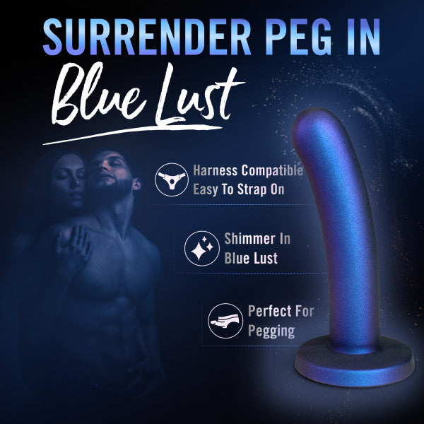 The Blush Surrender Intermediate 5.75 Inch Silicone Beginner & Pegging Dildo stands out with highlighted features: "Harness Compatible, Easy to Strap On, Shimmer in Blue Lust, Perfect for Pegging." Made from body-safe silicone for secure play. In the background, a couple embraces under the headline "Surrender Peg In Blue Lust.